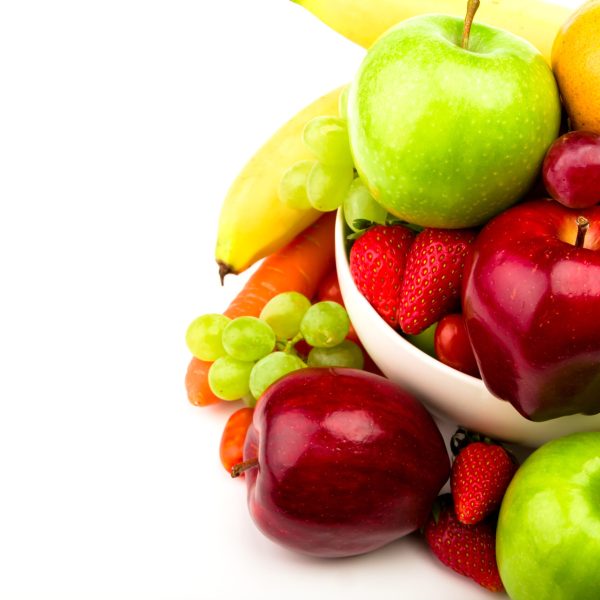 Fresh fruit on plate  Isolated on white
